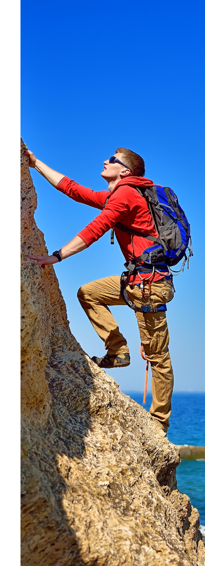 Outdoor Rock Climbing Person rock climbing outdoors wearing functional apparel